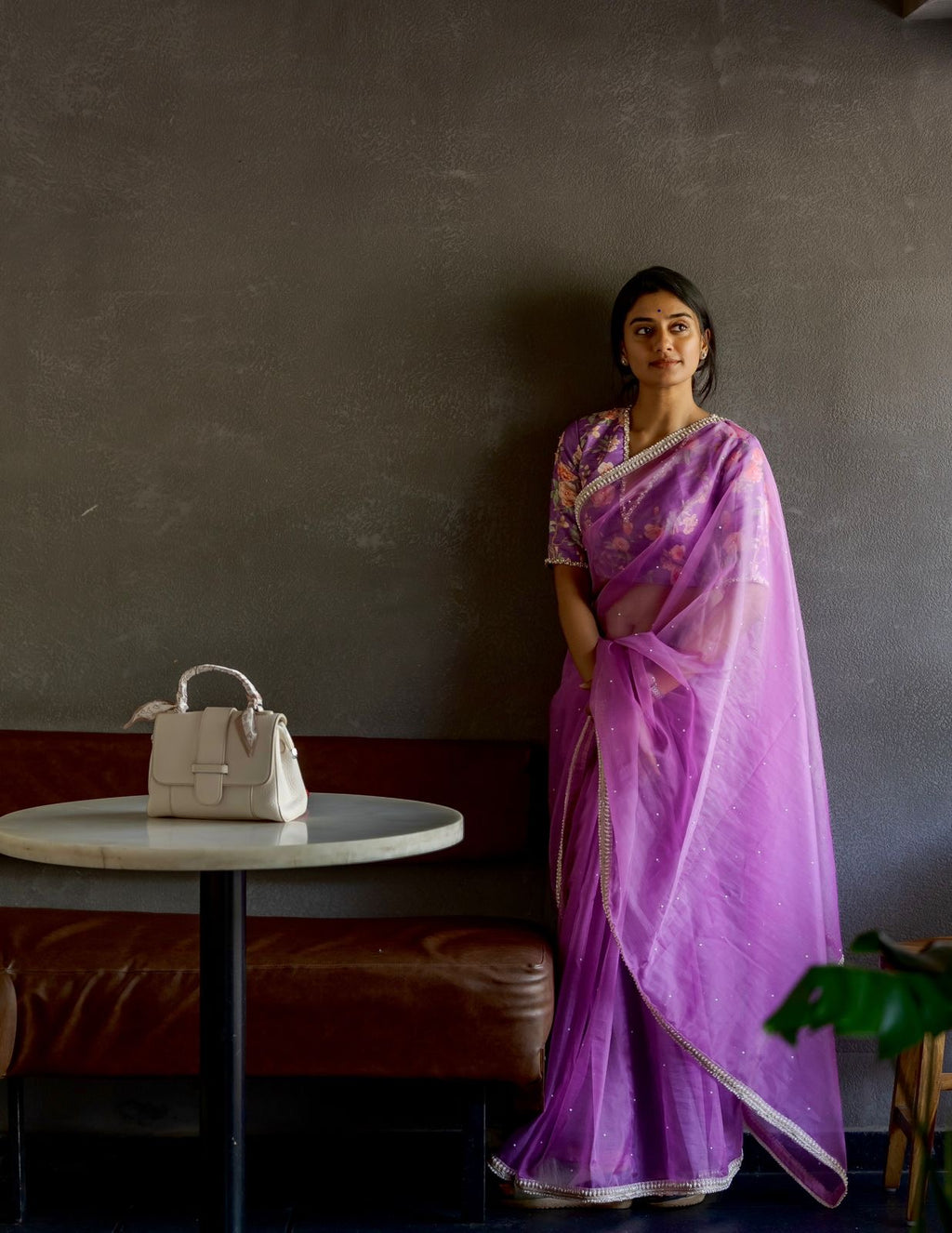 Lavender organza saree with pearl hand work blouse