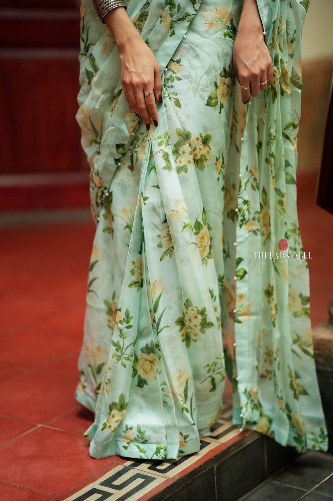 Sea green viscose jute floral saree (only saree)