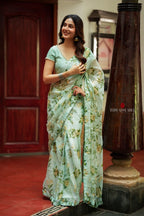 Sea green viscose jute floral saree (only saree)