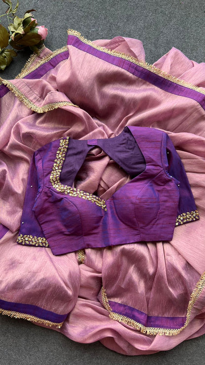 Pink tissue saree with purple hand work blouse