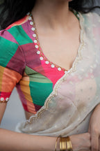 Beige georgette tissue saree with multi hand work blouse