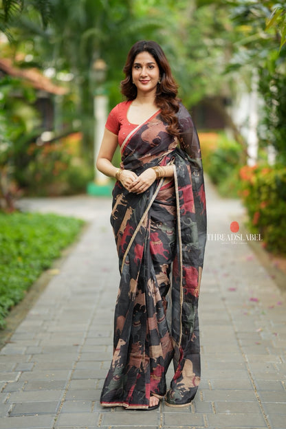 Black cow kota saree with paisley hand work blouse