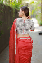 Orange rust saree with pearl work blouse