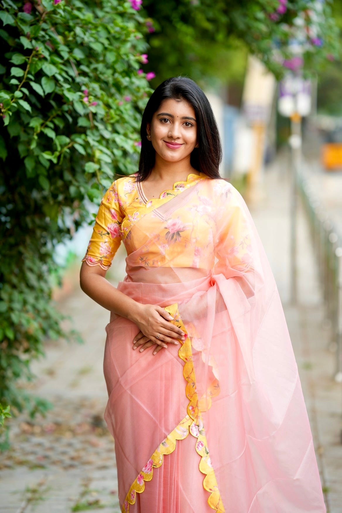 Peach organza saree with yellow floral hand work blouse