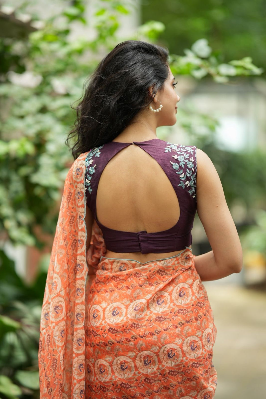 Pastel peach chiffon saree with brown hand work blouse