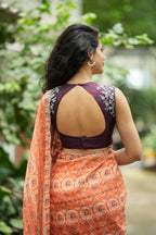 Pastel peach chiffon saree with brown hand work blouse