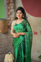 Green soft tissue saree with embroidered blouse