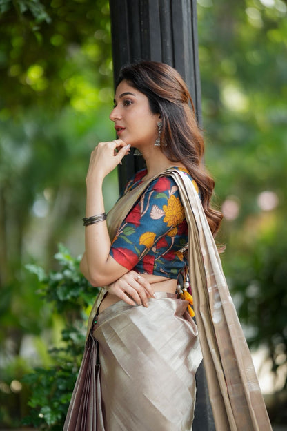 Silver soft tissue saree with blue kalamakari blouse