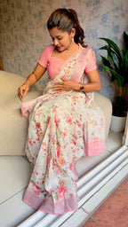 Cream linen cotton floral saree with checked blouse