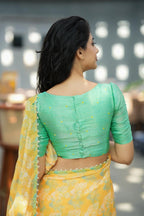 Green tissue floral hand work blouse (only blouse)