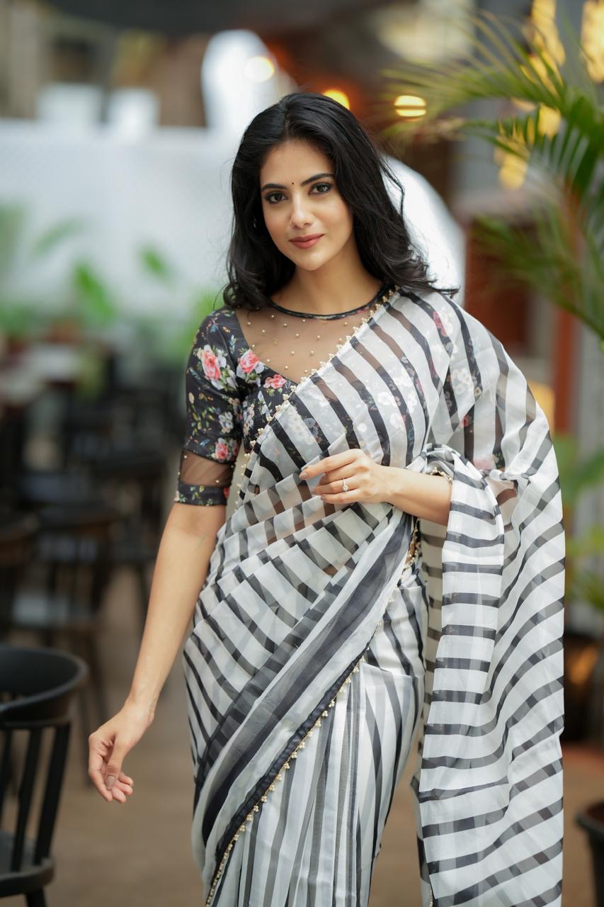 Black & white stripe organza saree with hand work blouse