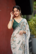 Half white chiffon floral saree with hand work blouse