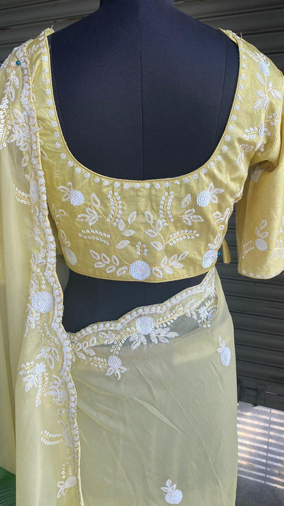 Banana yellow organza saree with silk embroidery blouse
