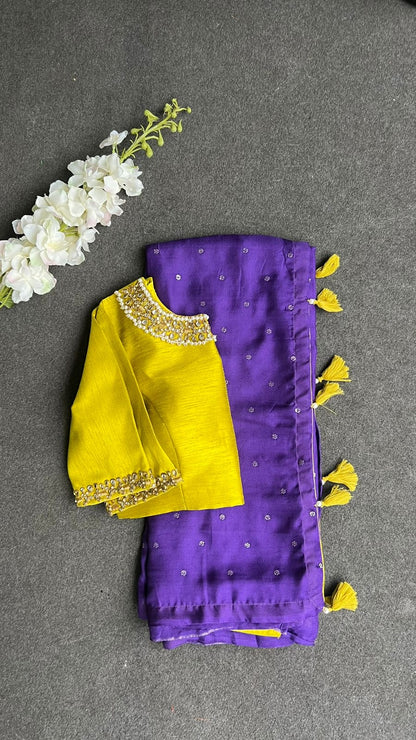 Purple soft jute saree with yellow JEWEL neck hand work blouse