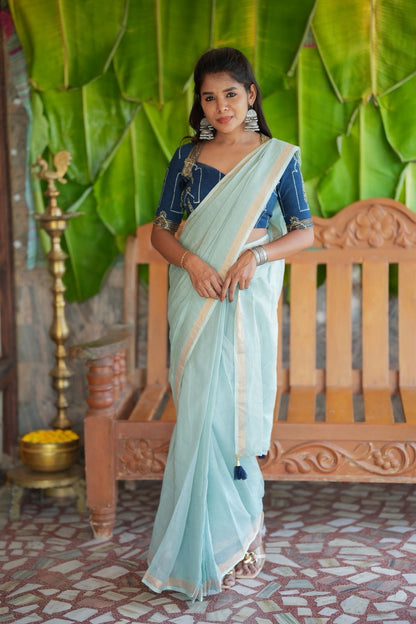 Aqua blue kota doria saree with hand work blouse