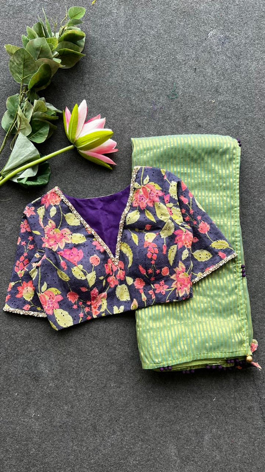 Green stripped tissue saree with purple floral hand work blouse