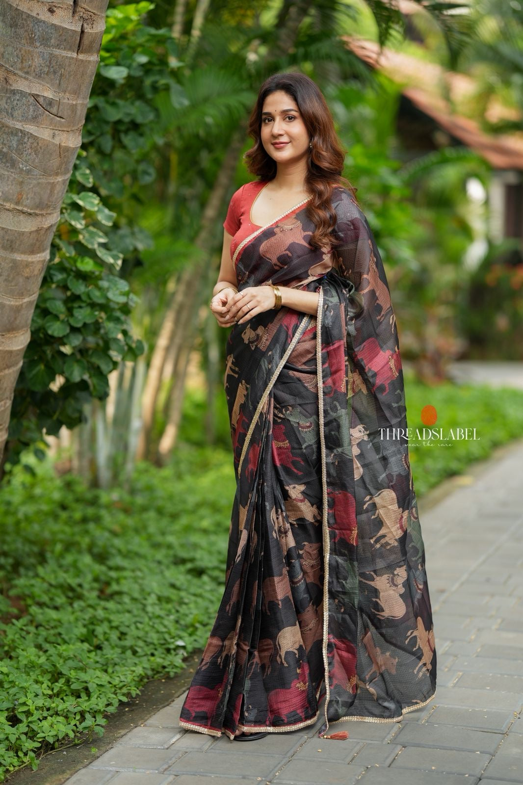 Black cow kota saree with paisley hand work blouse