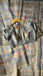 Grey floral organza saree with hand worked blouse