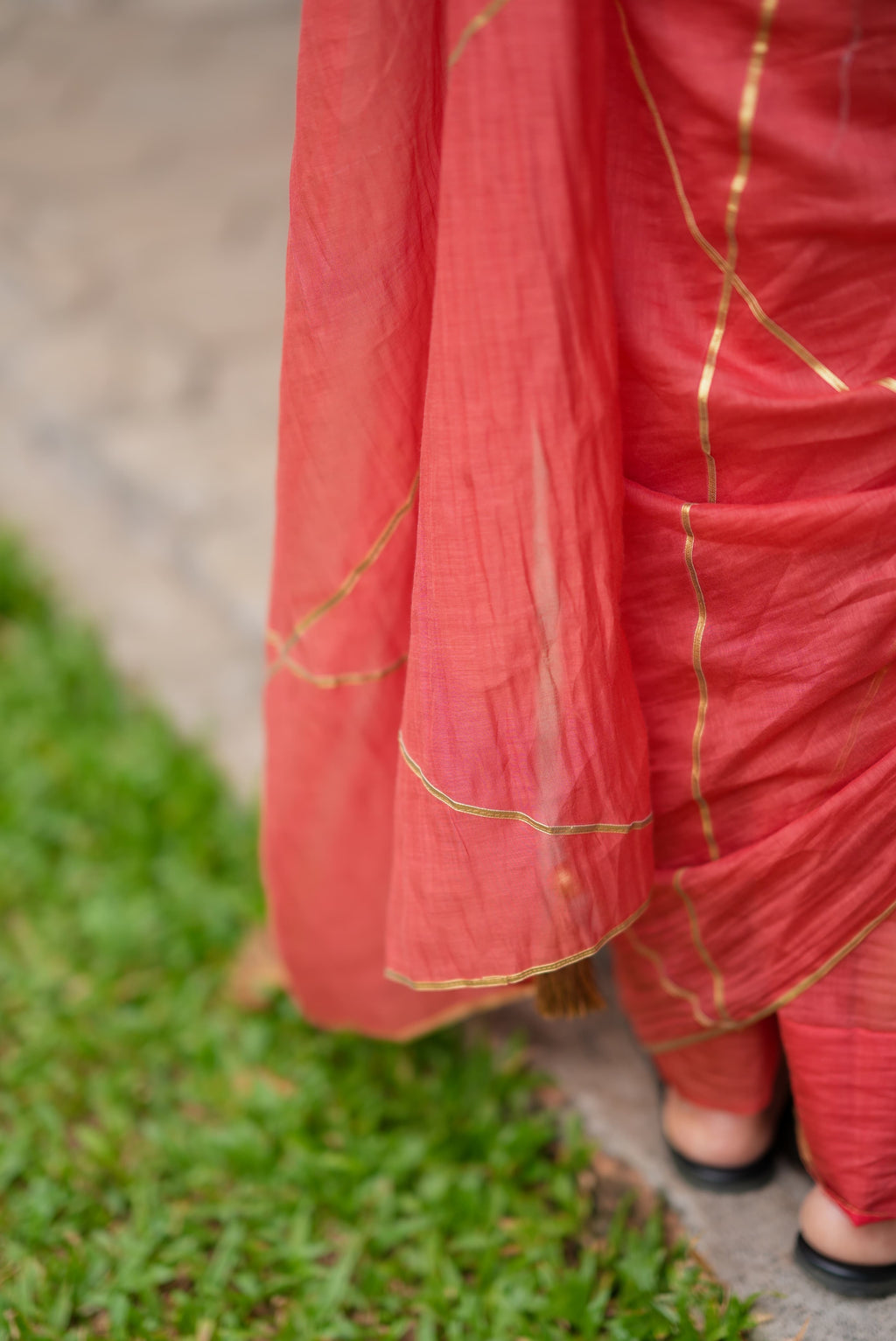 Orange rust saree with tissue handwork blouse