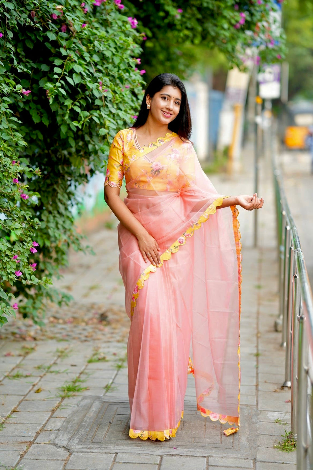 Peach organza saree with yellow floral hand work blouse