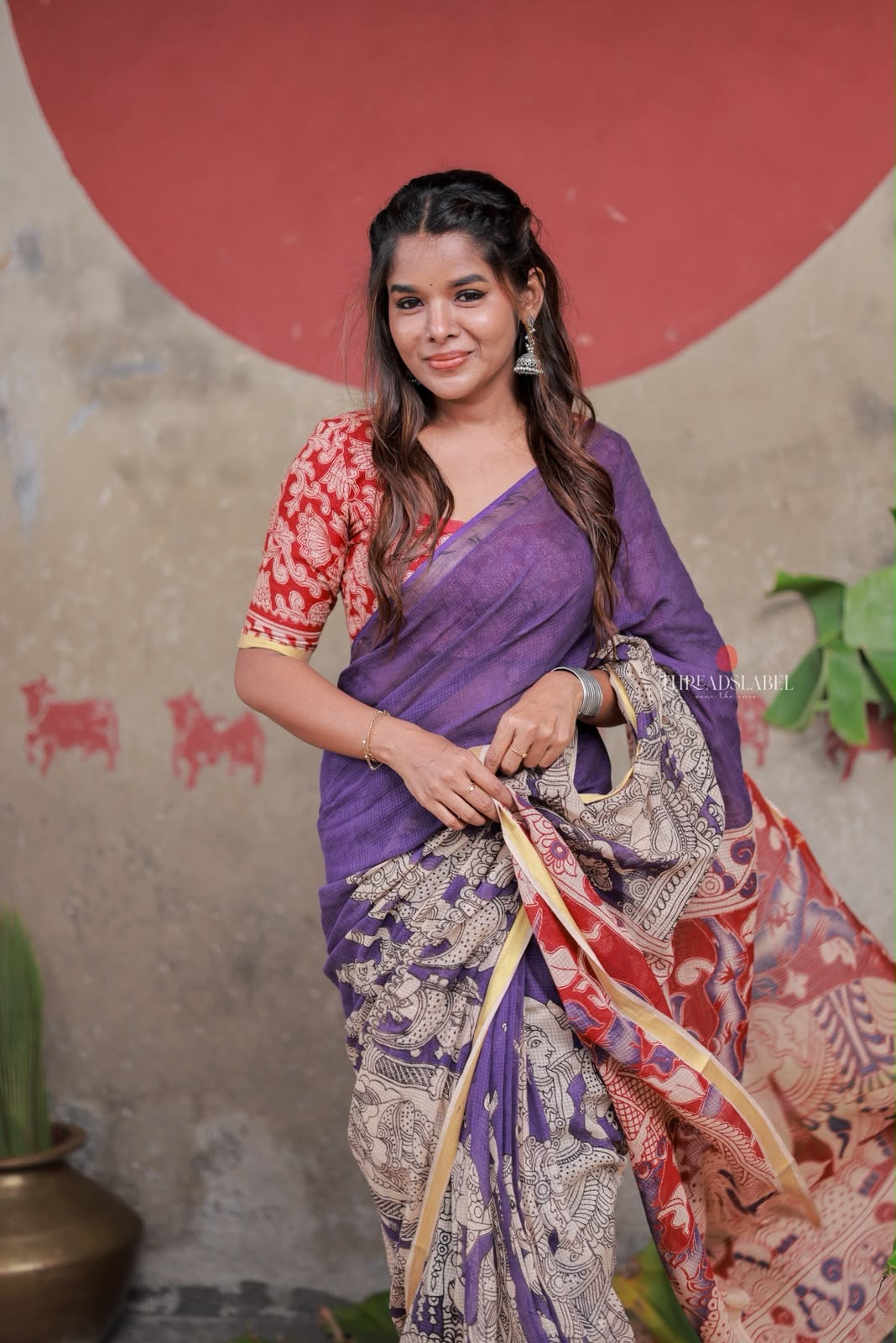 Purple kota saree with kalamkari work blouse