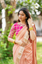 Peach banarasi saree with silk hand work blouse