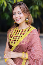 Brown jute saree with banarasi hand work blouse