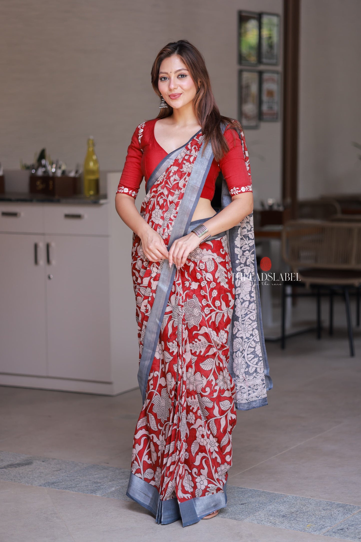 Reddish maroon linen cotton kalamkari saree with embroidery blouse