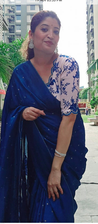 Aegean blue jute saree with white handmade blouse