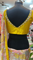 Yellow viscose floral saree with hand worked blouse