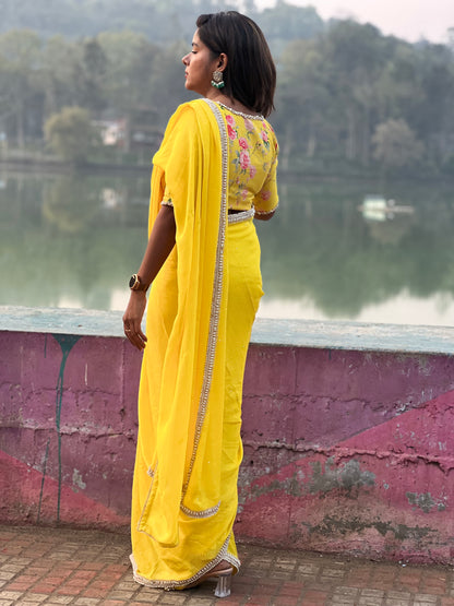 Yellow jute saree with pearl hand work blouse