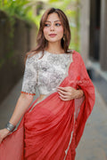 Orange rust saree with pearl work blouse