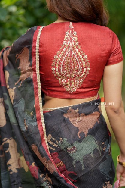 Black cow kota saree with paisley hand work blouse
