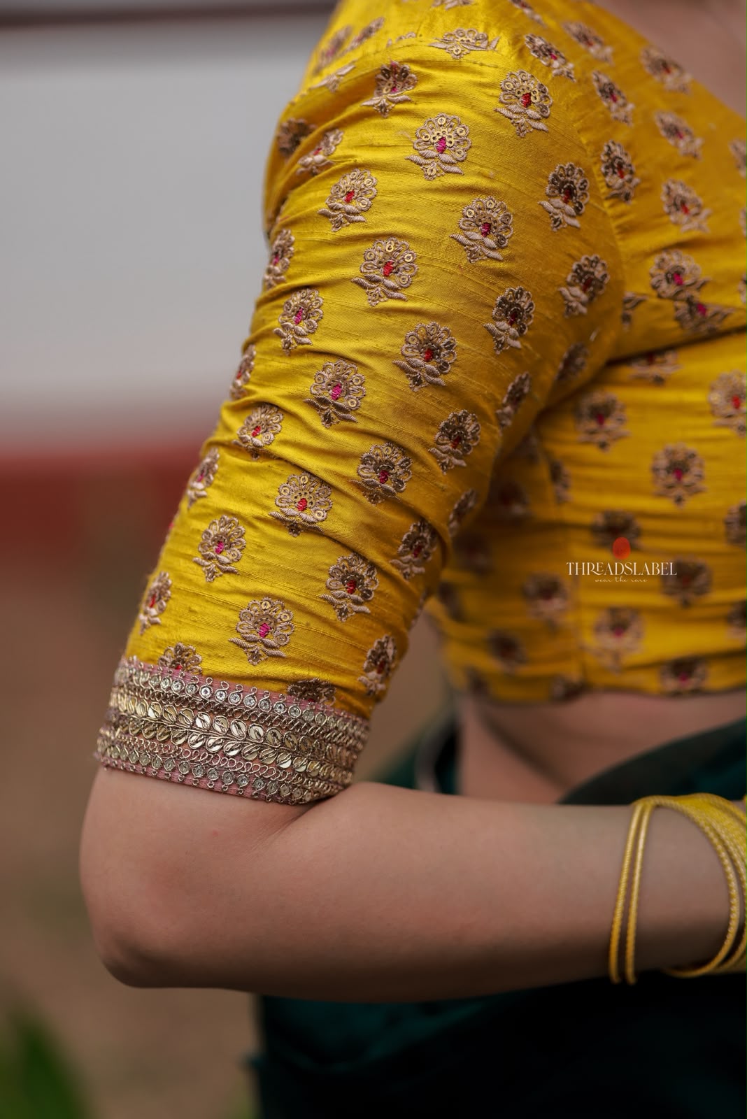 Green organza saree with yellow hand work blouse
