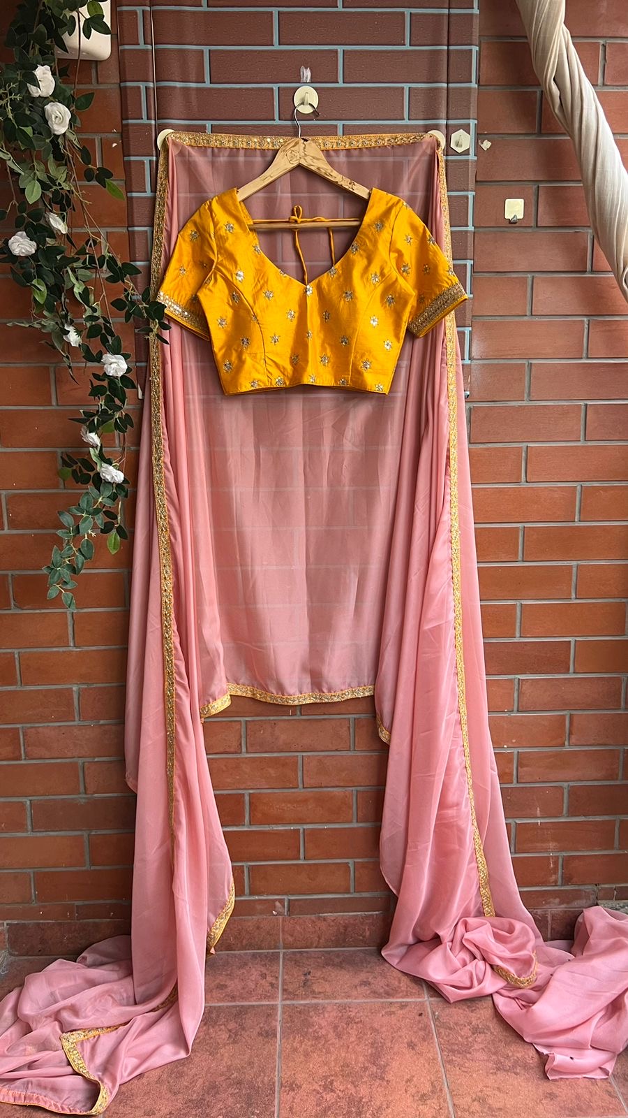Peach organza saree with yellow embroidery blouse