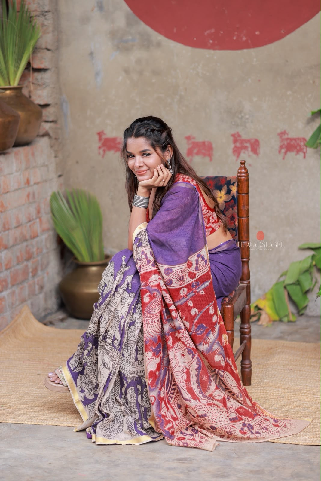 Purple kota saree with kalamkari work blouse