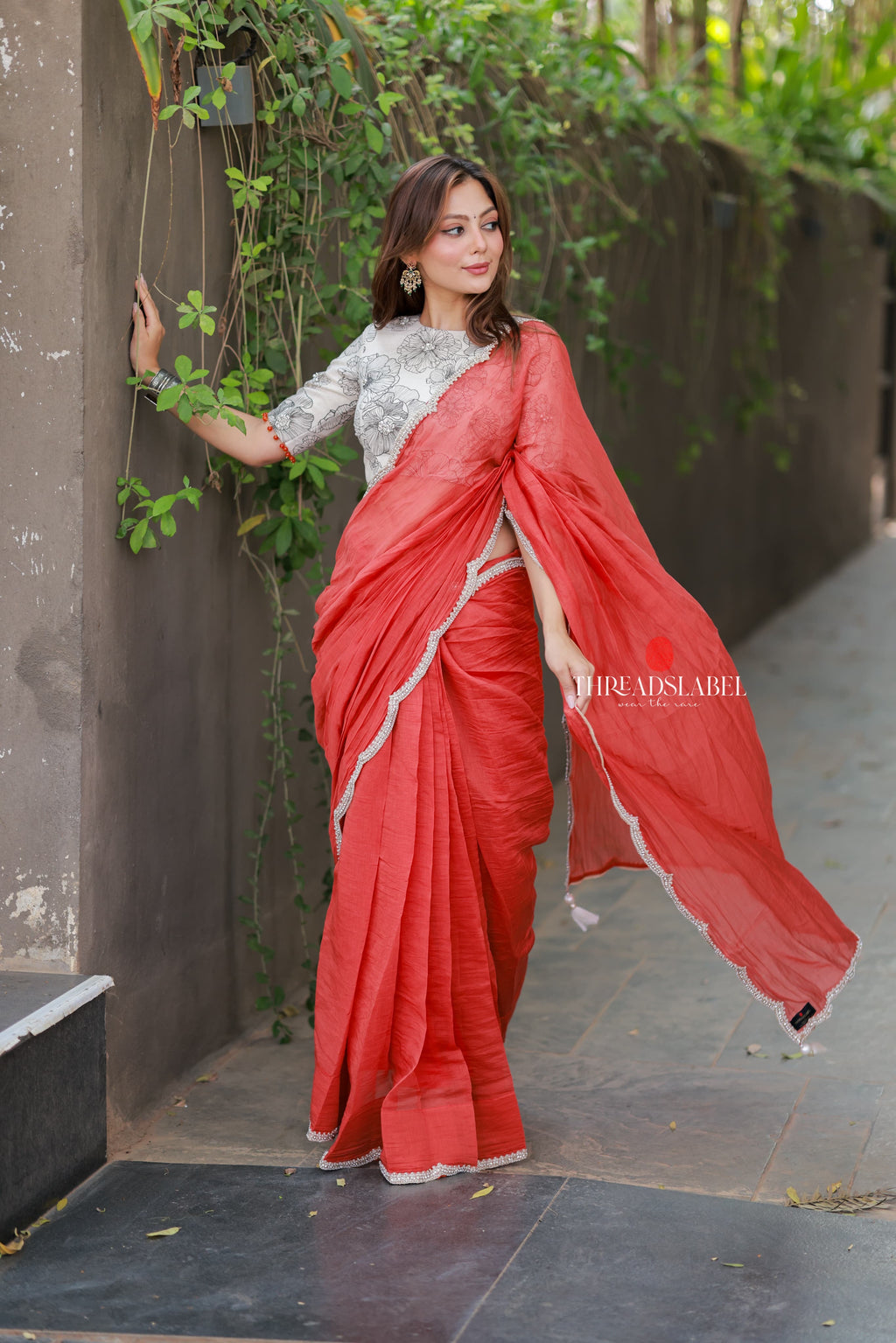 Orange rust saree with pearl work blouse