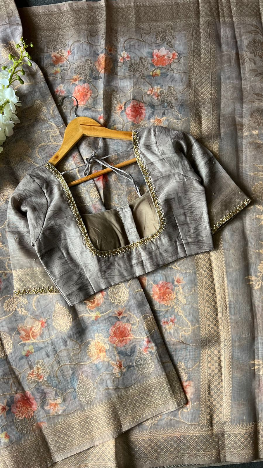 Grey floral organza saree with hand worked blouse