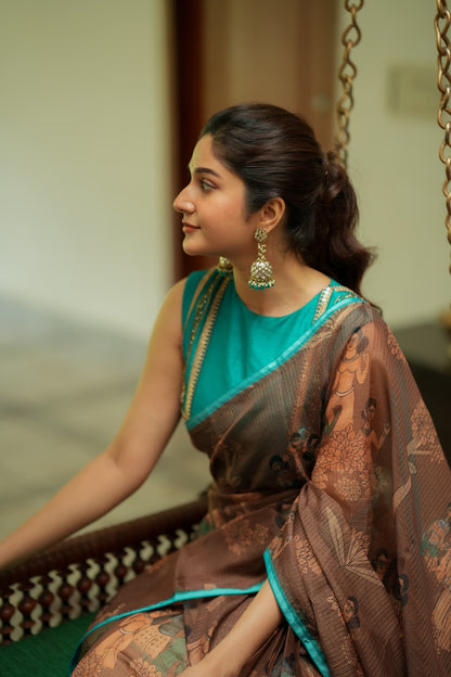 Brown kalamkari kota saree with blue hand work blouse