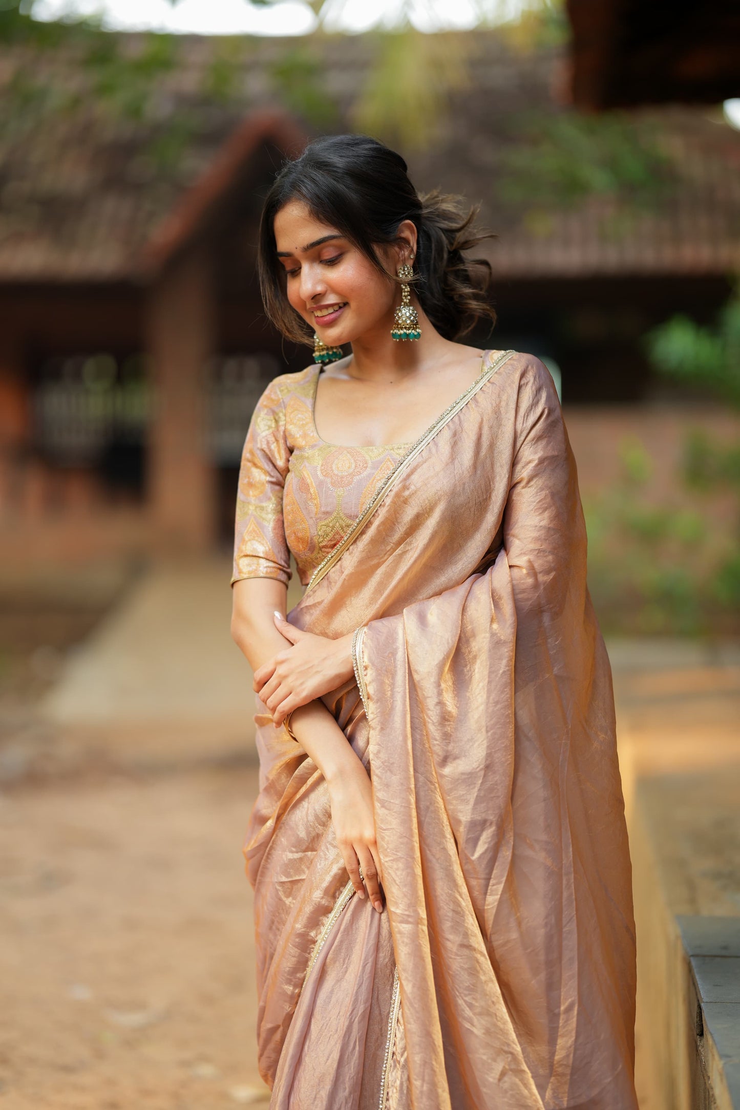 Golden peach glass tissue saree with banarasi blouse