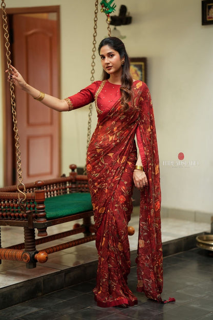 Maroon chiffon floral saree with hand work blouse