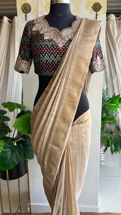 Golden cream tissue saree with ajrak embroidery blouse