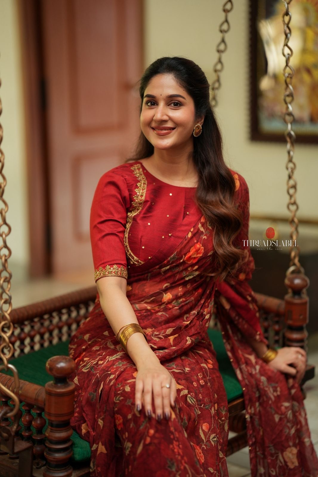 Maroon chiffon floral saree with hand work blouse