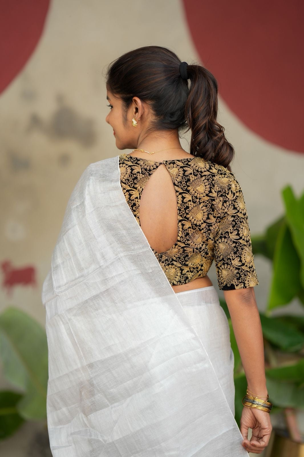 White soft tissue saree with heavy embroidery blouse