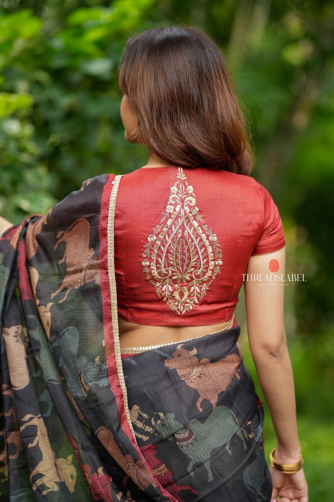 Black cow kota saree with paisley hand work blouse