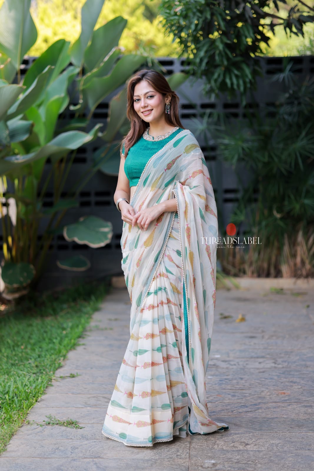 Cream chiffon paisley print saree (only saree)