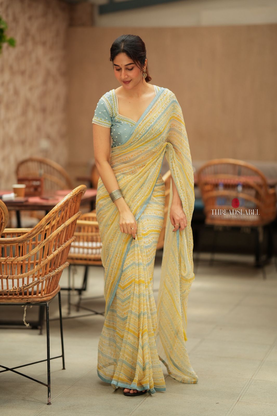 Western yellow & blue chiffon striped saree with hand work blouse