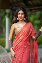 Orange rust saree with tissue handwork blouse