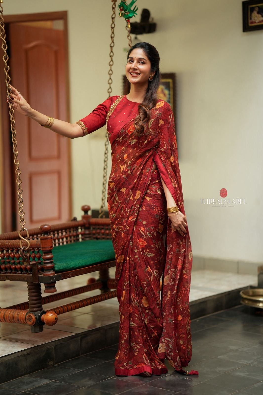 Maroon chiffon floral saree with hand work blouse