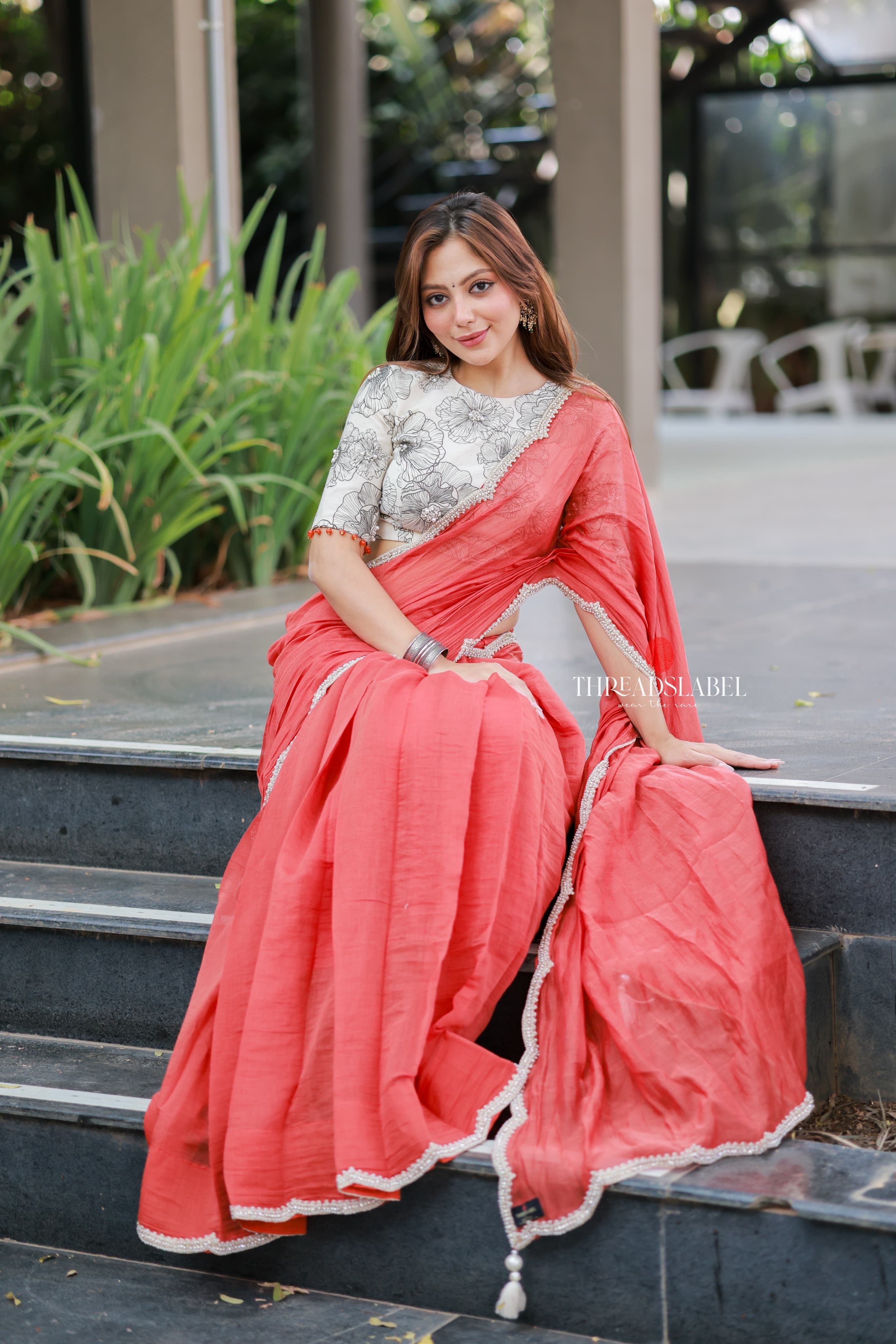 Orange rust saree with pearl work blouse
